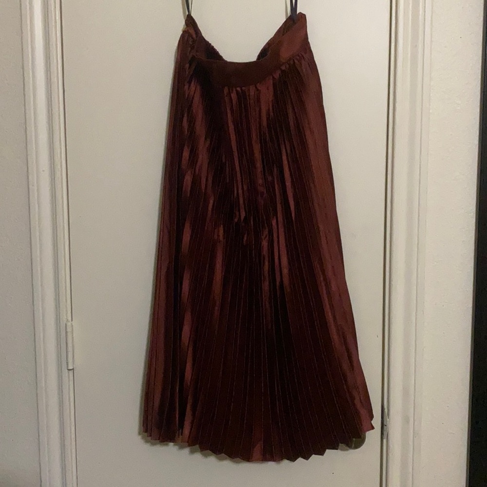 Burgundy Metallic mid length skirt with side zipper